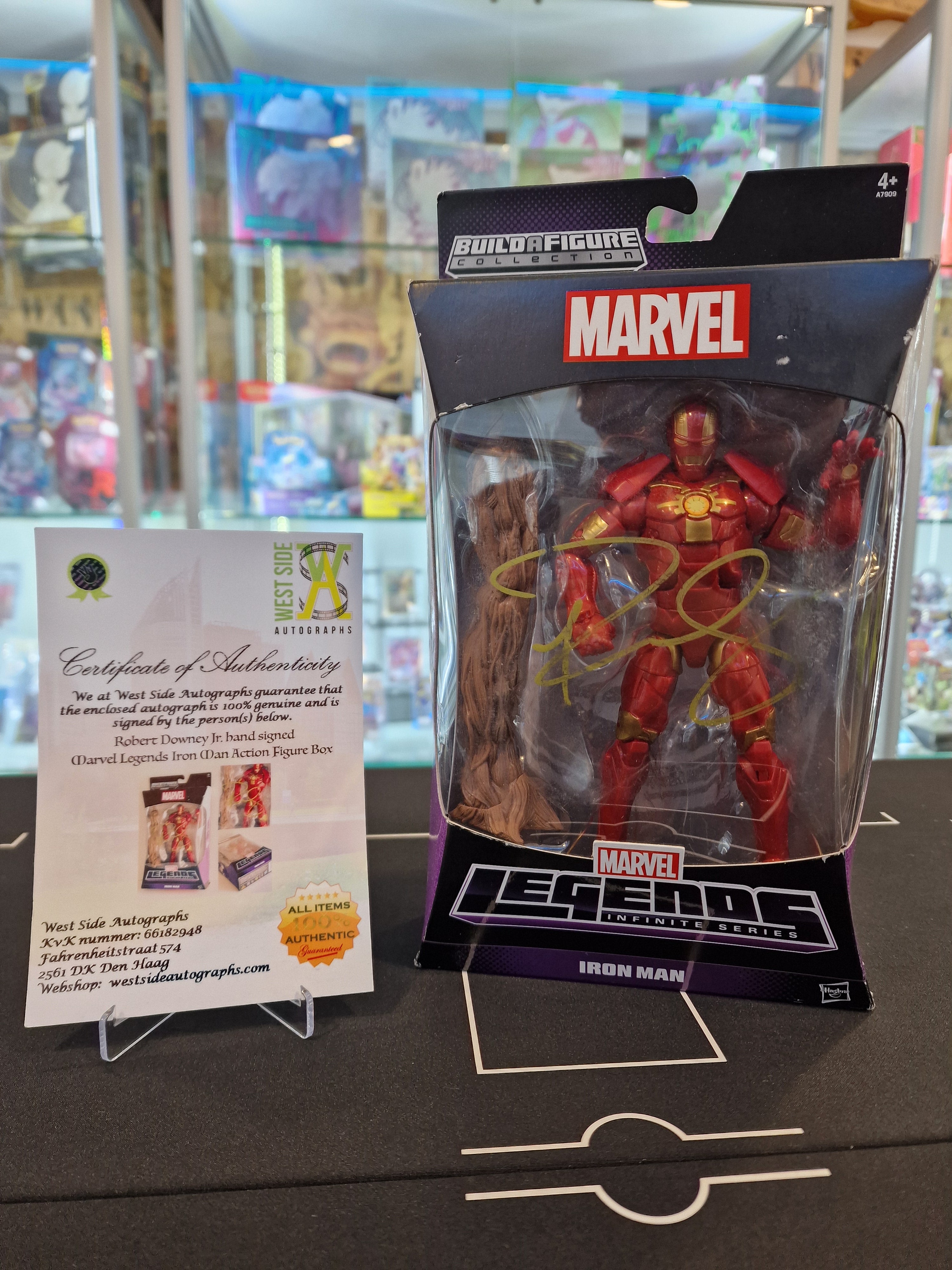 Marvel Action Figure Iron Man signed by Robert Downey Jr. with certification
